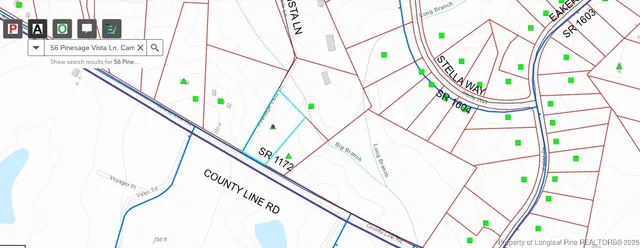 a picture of a room with a white house