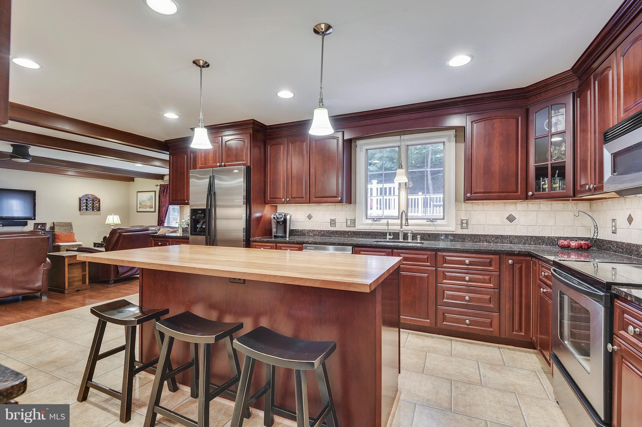 14 Glen Alpine Road Phoenix, MD 21131 - Photo 8 of 30 Kitchen w/island/seating opens to family room