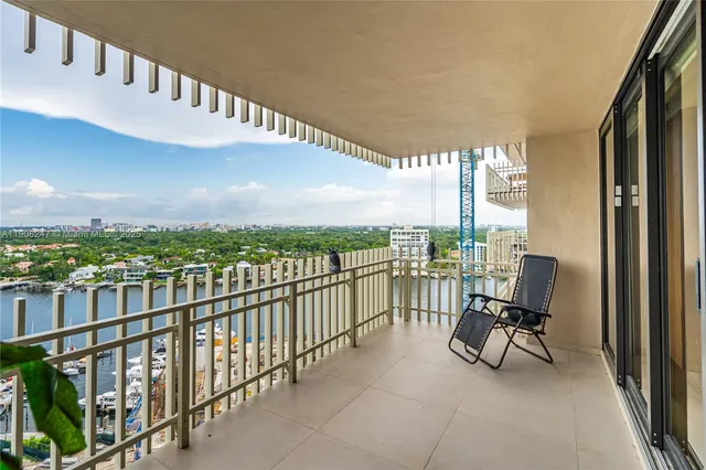 a view of balcony with furniture
