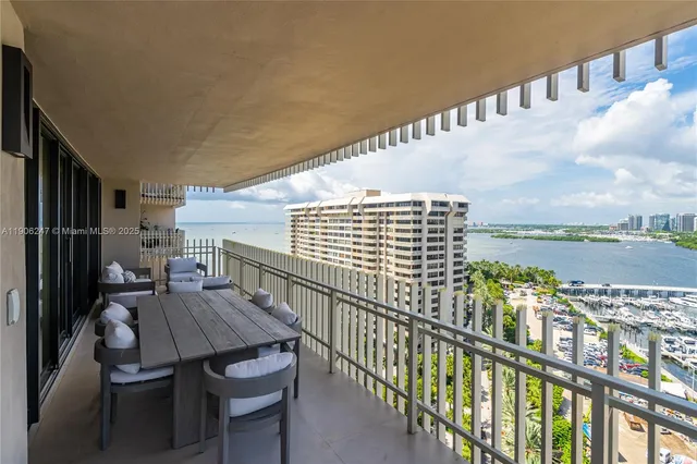 a view of balcony with furniture