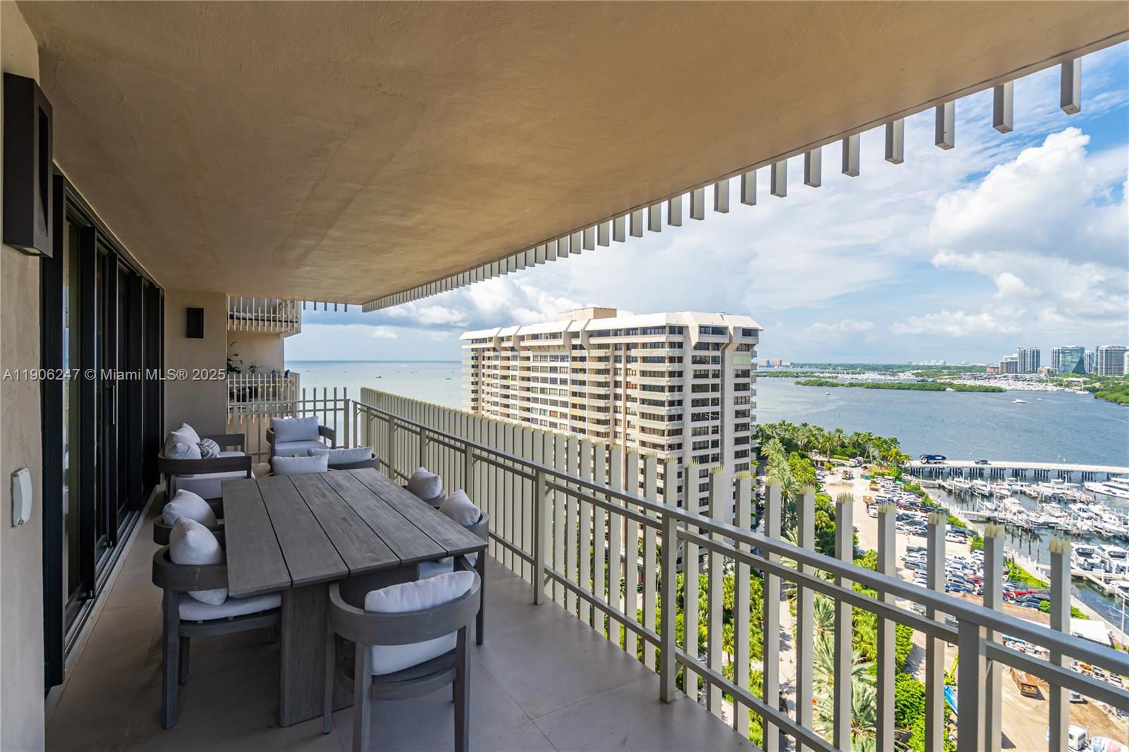 3 Grove Isle Drive, Unit C1710 Miami, FL 33133 - Photo 10 of 37 a view of balcony with furniture