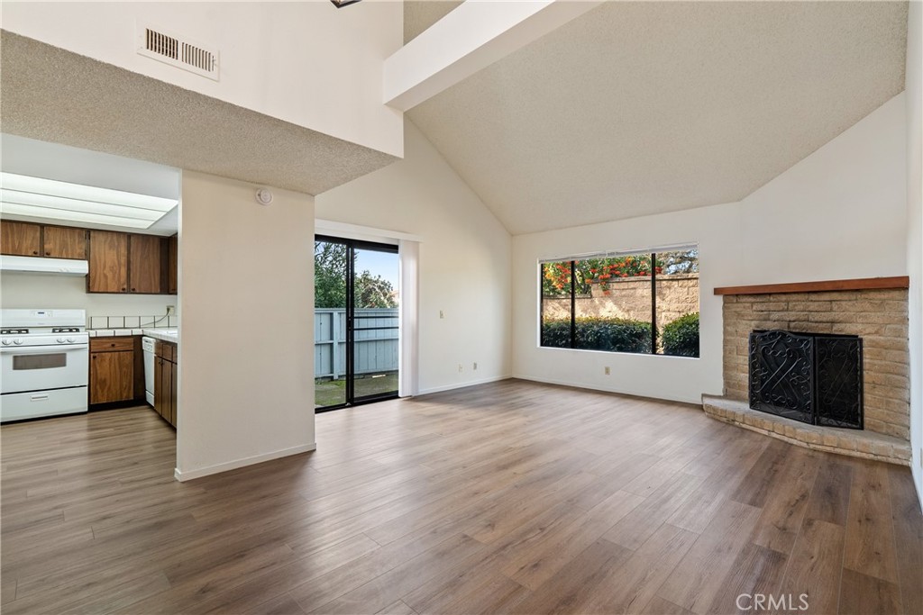 7 Quail Ridge Drive Atascadero, CA 93422 - Photo 5 of 29 a view of a livingroom with a fireplace and wooden floor
