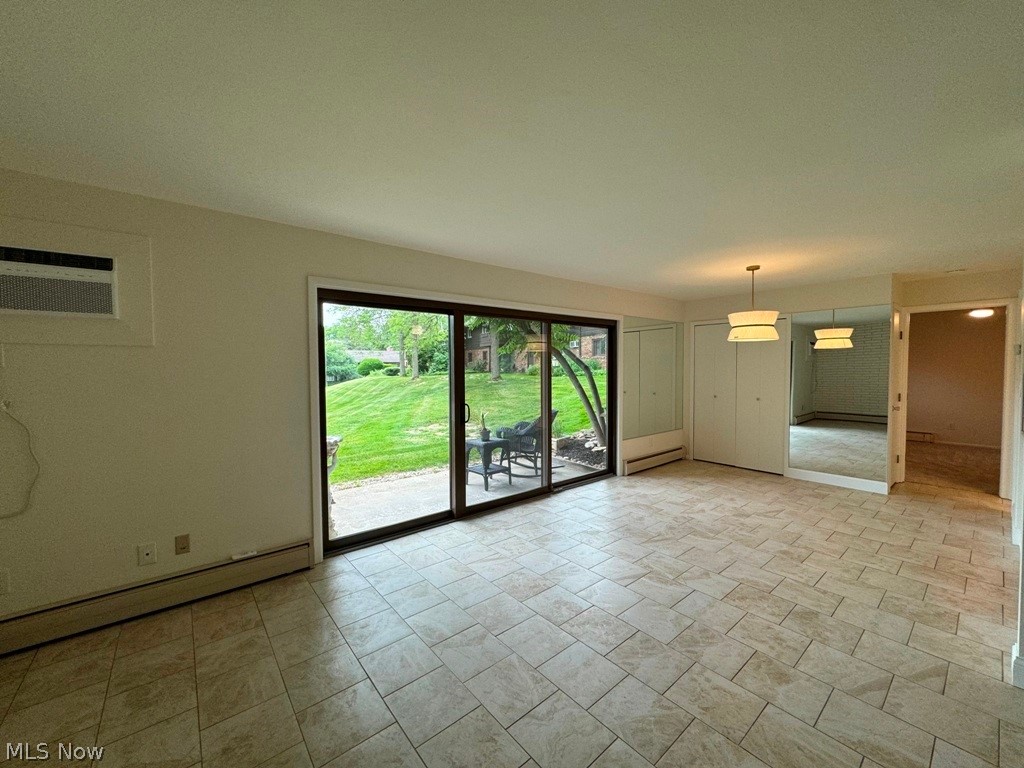 5711 Som Center Road, Unit 29 Solon, OH 44139 - Photo 3 of 15 Living room and dining area