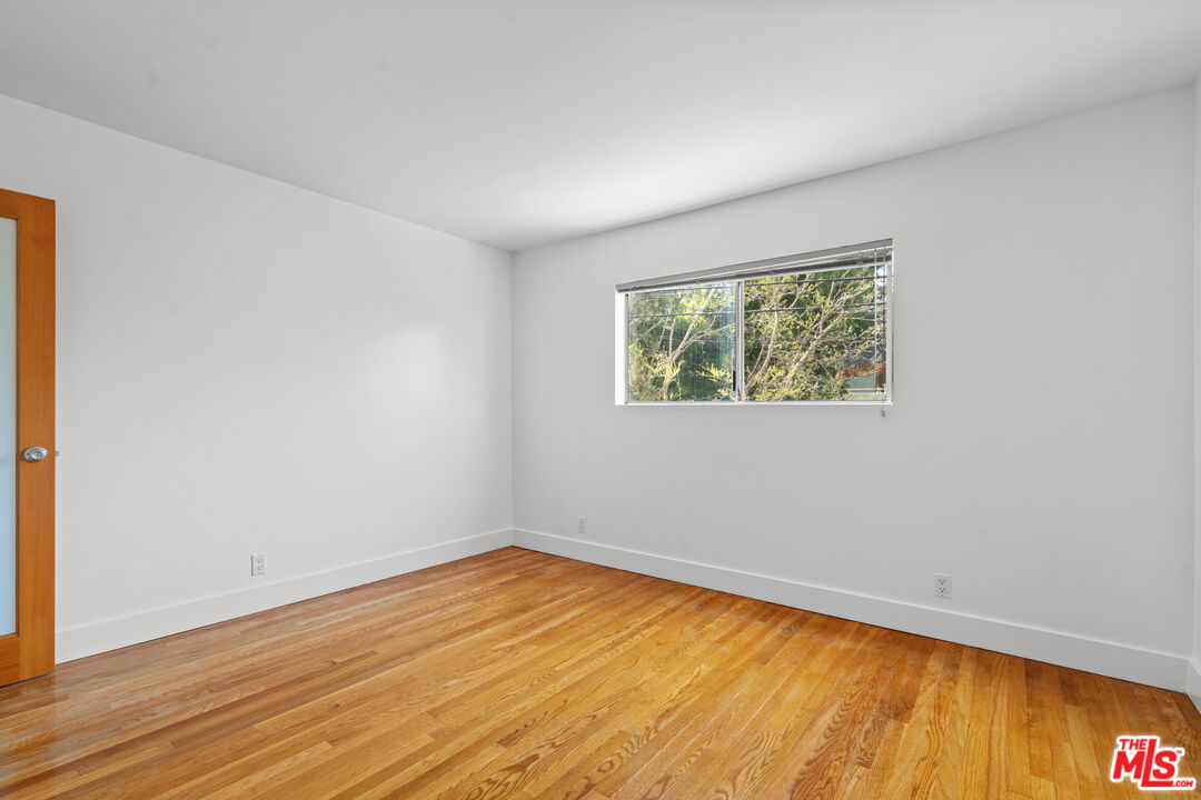 511 Rialto Avenue, Unit 4 Venice, CA 90291 - Photo 16 of 17 a view of empty room with wooden floor