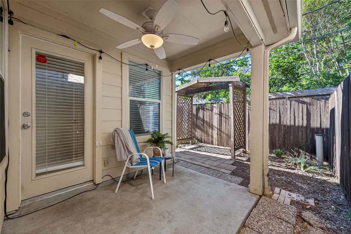 2910 Crescent Bend Road Spring, TX 77388 - Photo 27 of 35 Step onto the back patio with its ceiling fan and take in the backyard—a low-maintenance space made for relaxing, entertaining friends, or enjoying a small garden of herbs and flowers, complete with a cozy garden pavilion for shaded seating or a BBQ.