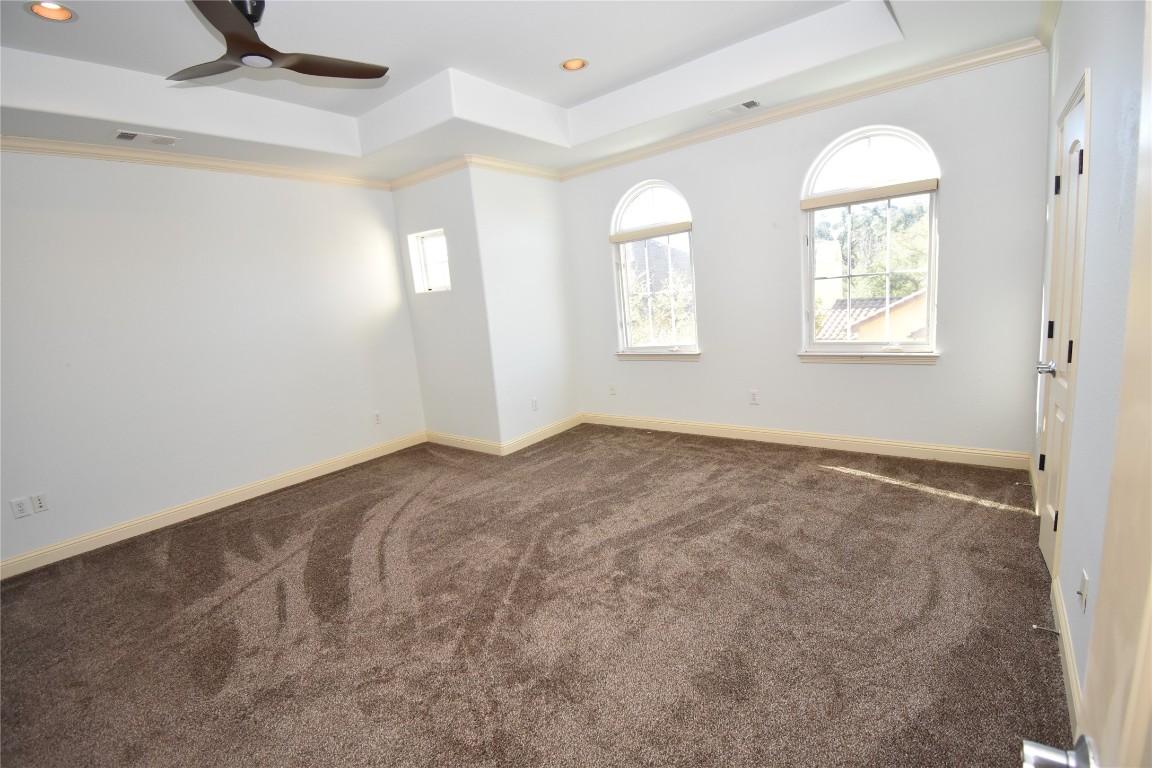12105 Terraza Circle, Unit 67 Austin, TX 78726 - Photo 12 of 30 a view of empty room with windows