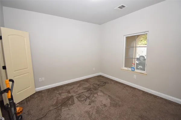 an empty room with a window