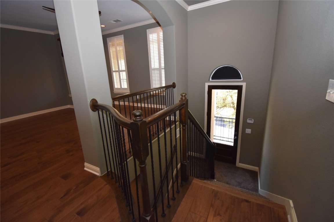 12105 Terraza Circle, Unit 67 Austin, TX 78726 - Photo 25 of 30 a view of entryway and hall with wooden floor
