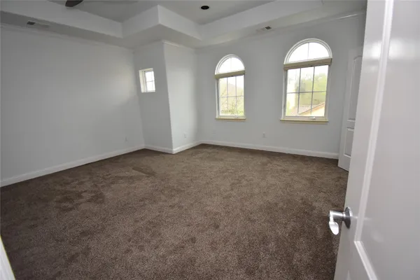 a view of a room with an empty space