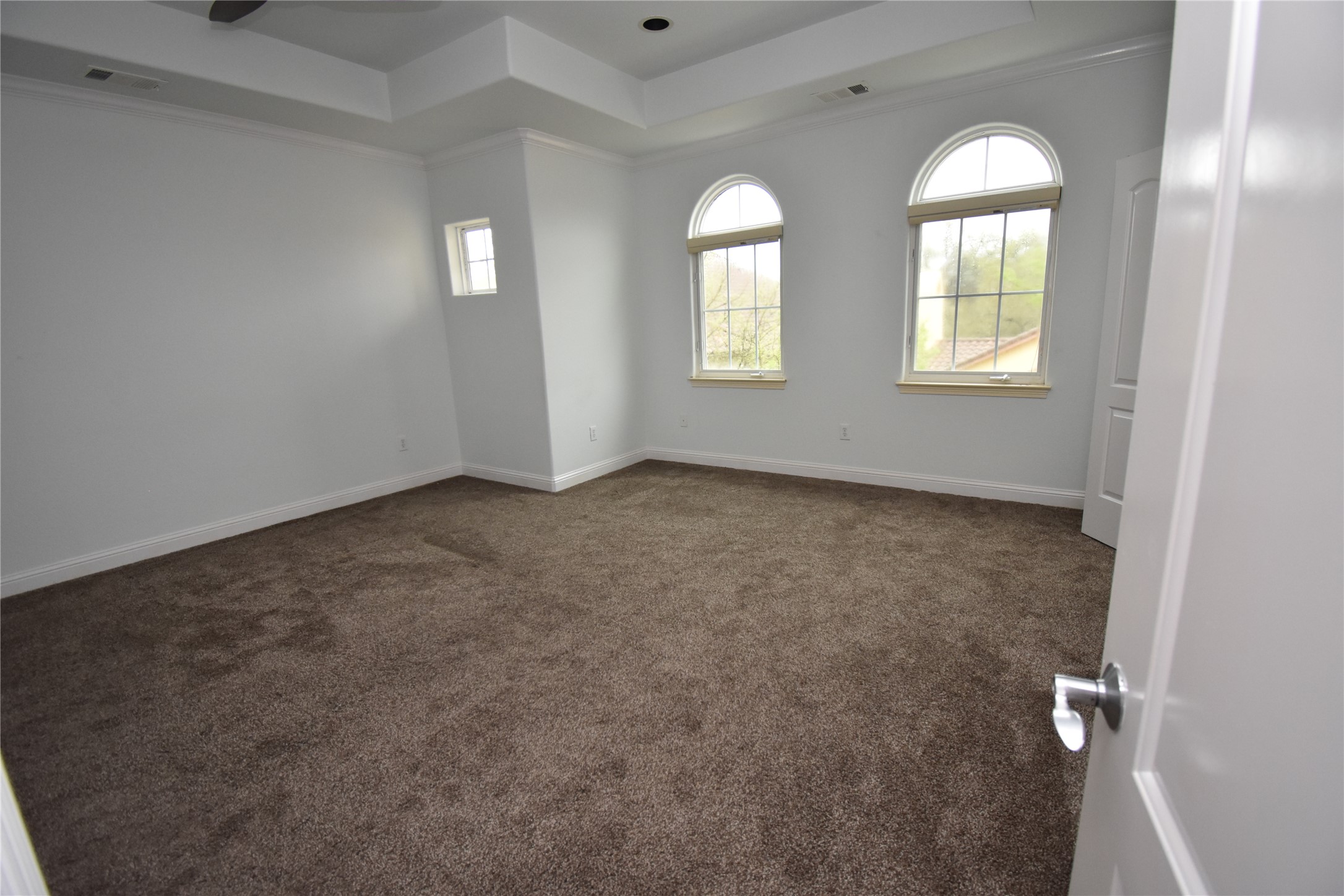 12105 Terraza Circle, Unit 67 Austin, TX 78726 - Photo 26 of 39 an empty room with windows