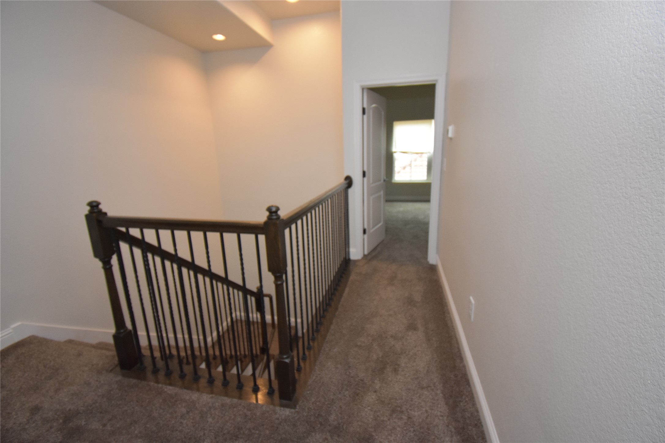 12105 Terraza Circle, Unit 67 Austin, TX 78726 - Photo 31 of 39 a view of a hallway with a window