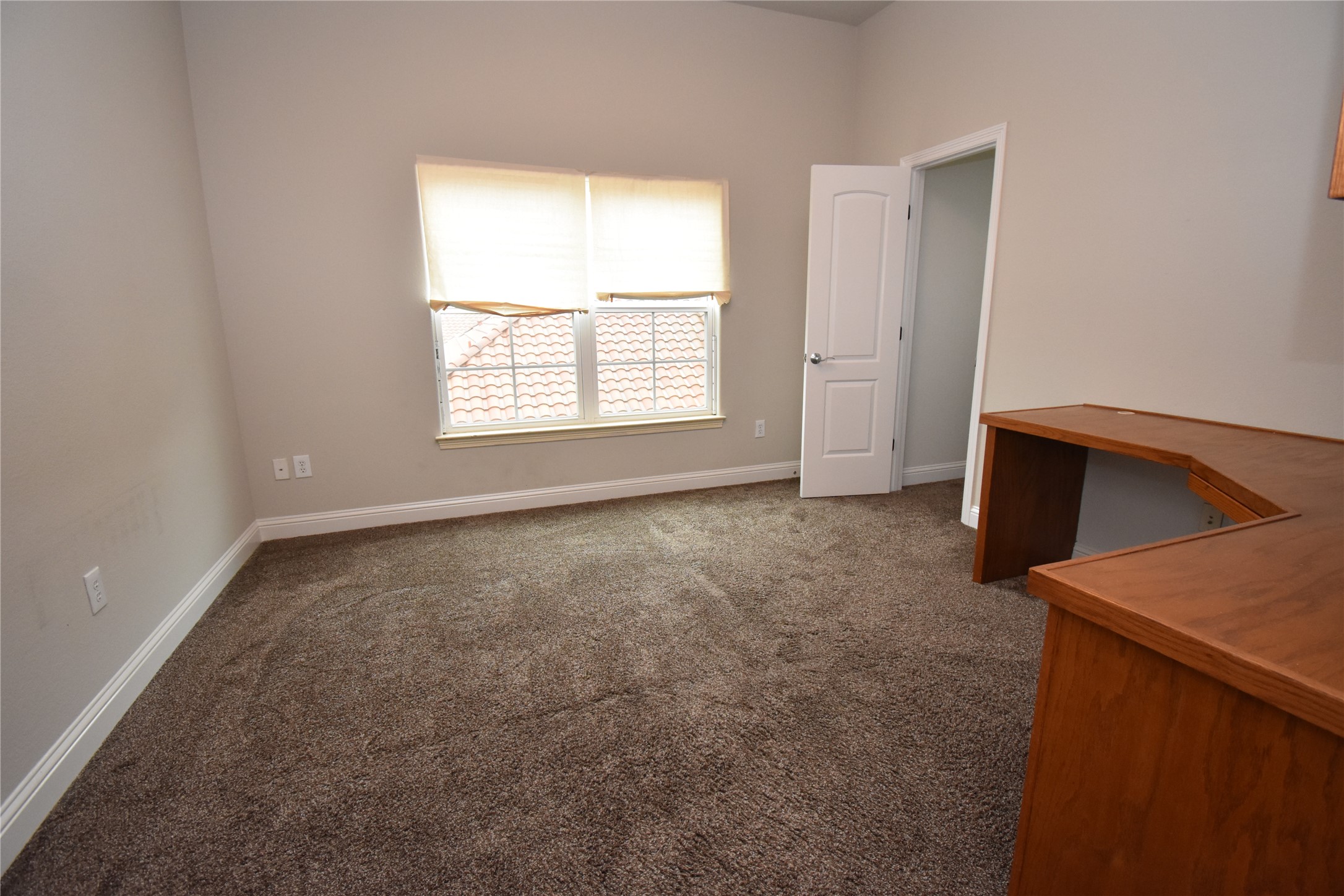 12105 Terraza Circle, Unit 67 Austin, TX 78726 - Photo 32 of 39 an empty room with a window
