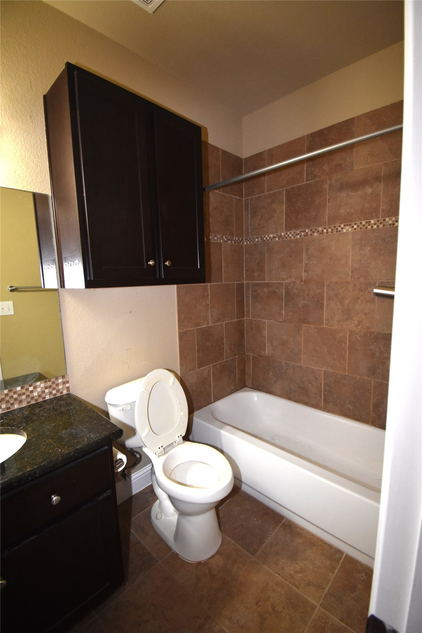12105 Terraza Circle, Unit 67 Austin, TX 78726 - Photo 39 of 39 a bathroom with a toilet a sink and a shower