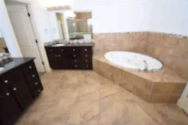 a bathroom with a sink and a vanity