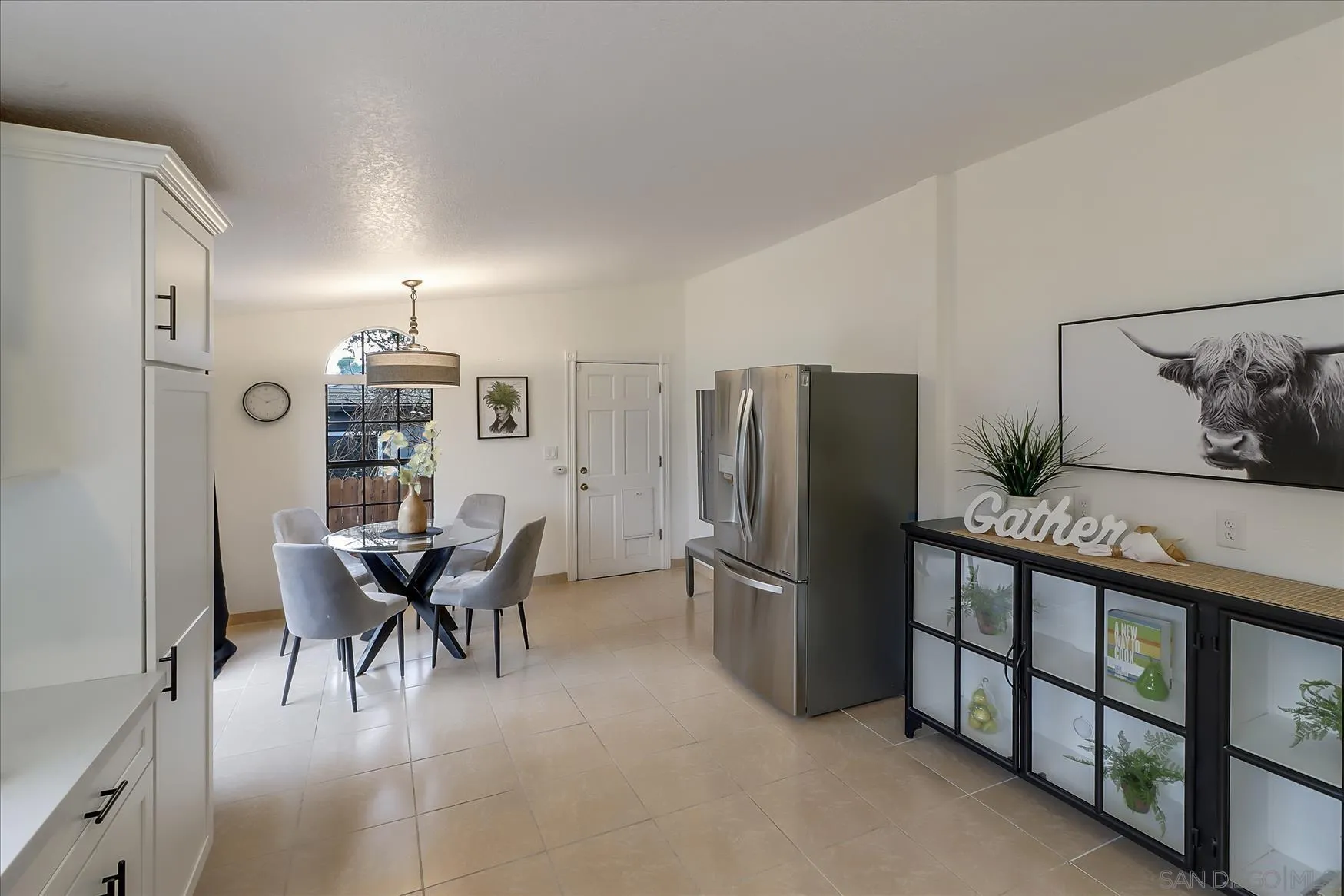 1521 D Street Hayward, CA 94541 - Photo 13 of 39 a dining room with furniture and a refrigerator