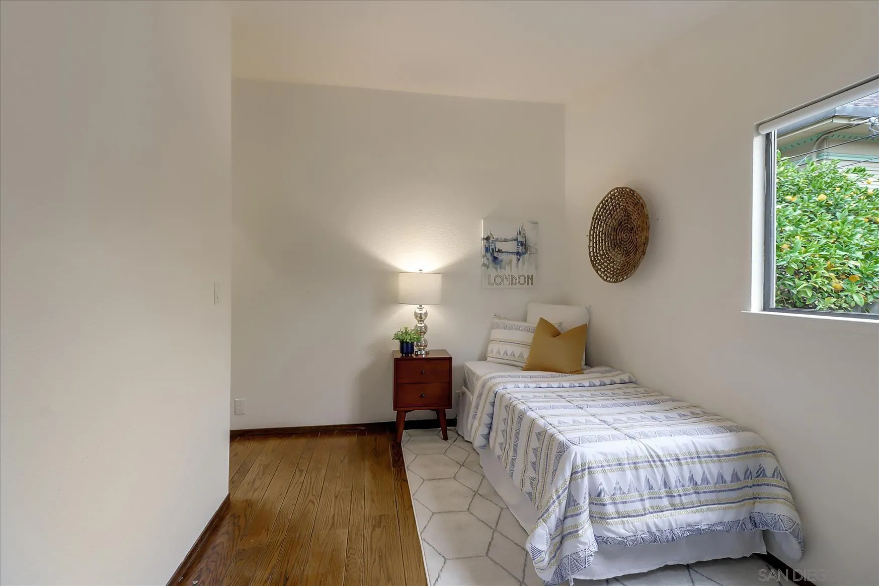 1521 D Street Hayward, CA 94541 - Photo 20 of 39 a bedroom with a bed and a window