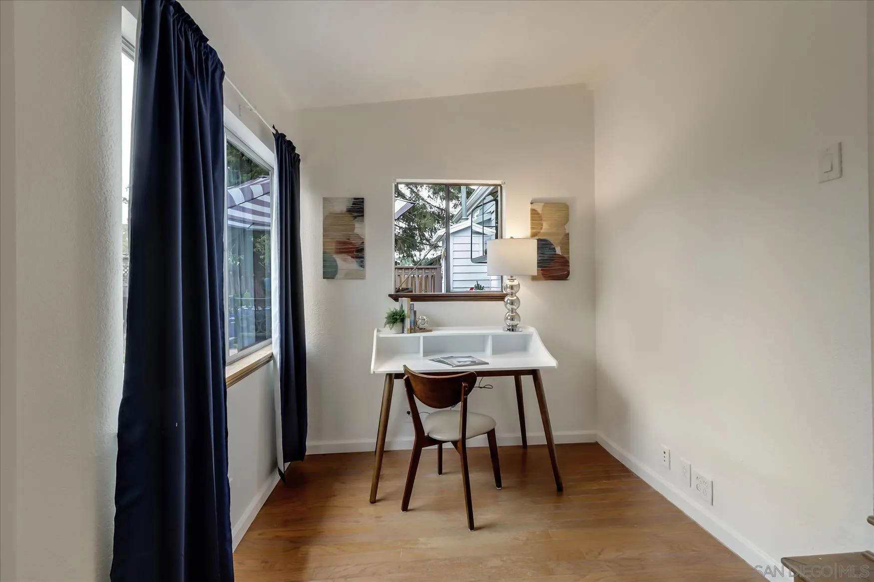 1521 D Street Hayward, CA 94541 - Photo 22 of 39 a view of a room that has a table and chairs in it