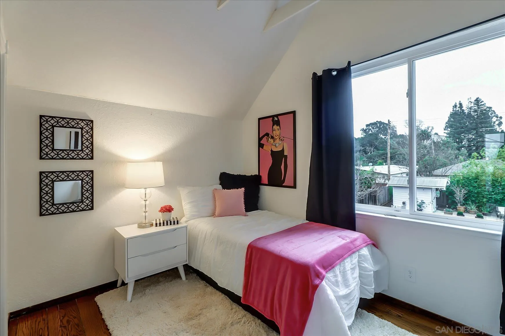 1521 D Street Hayward, CA 94541 - Photo 26 of 39 a bedroom with a bed and a large window