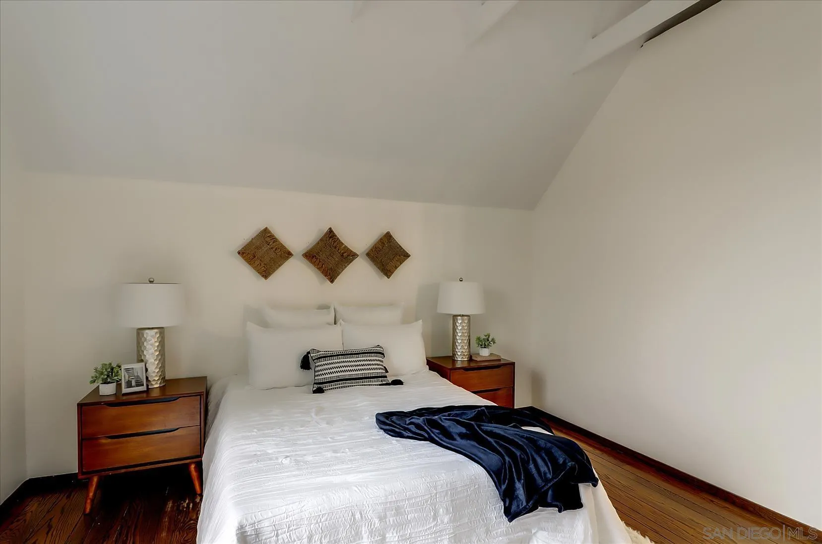 1521 D Street Hayward, CA 94541 - Photo 28 of 39 a bedroom with a bed and a lamp on desk