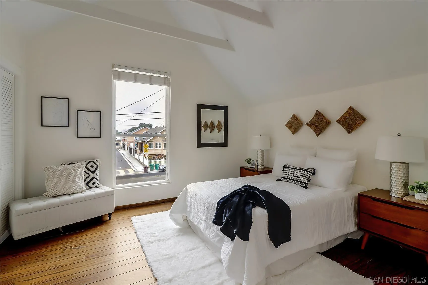 1521 D Street Hayward, CA 94541 - Photo 29 of 39 a bedroom with a bed and wooden floor