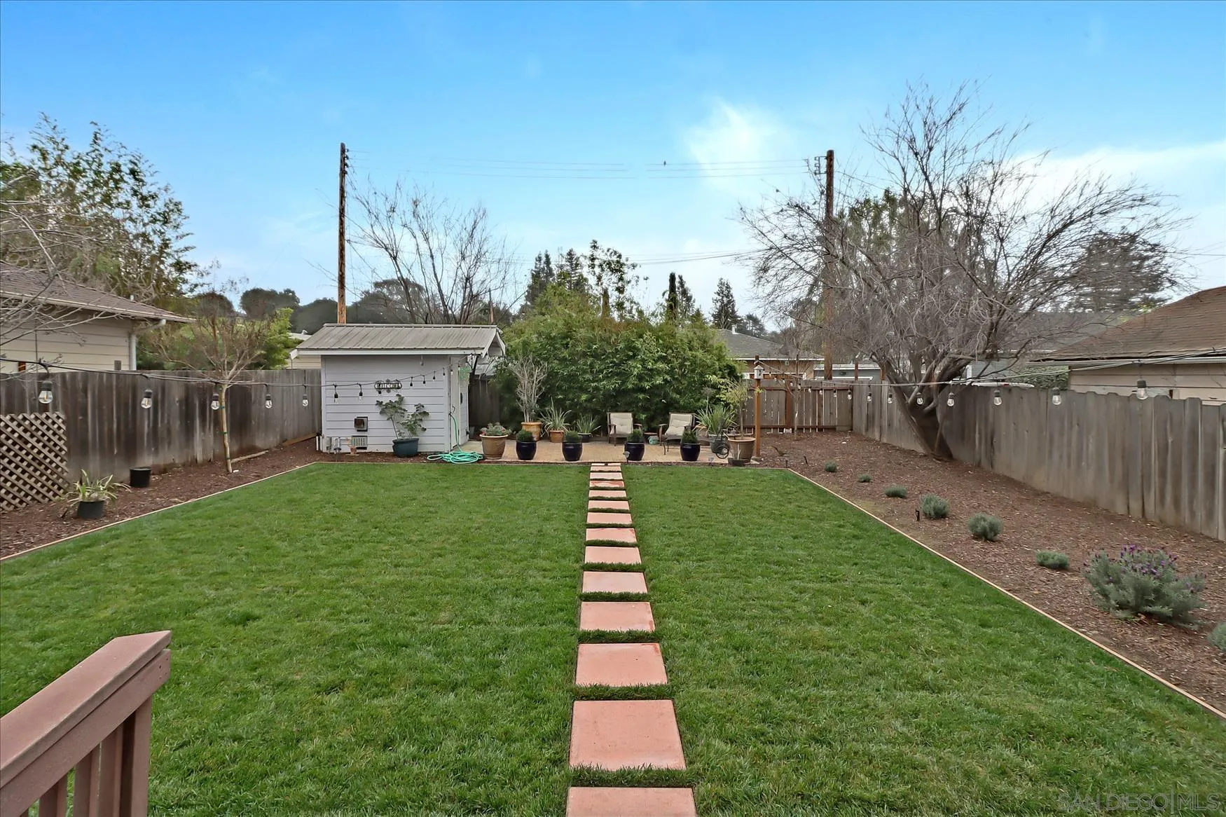 1521 D Street Hayward, CA 94541 - Photo 37 of 39 a front view of a house with a yard and trees