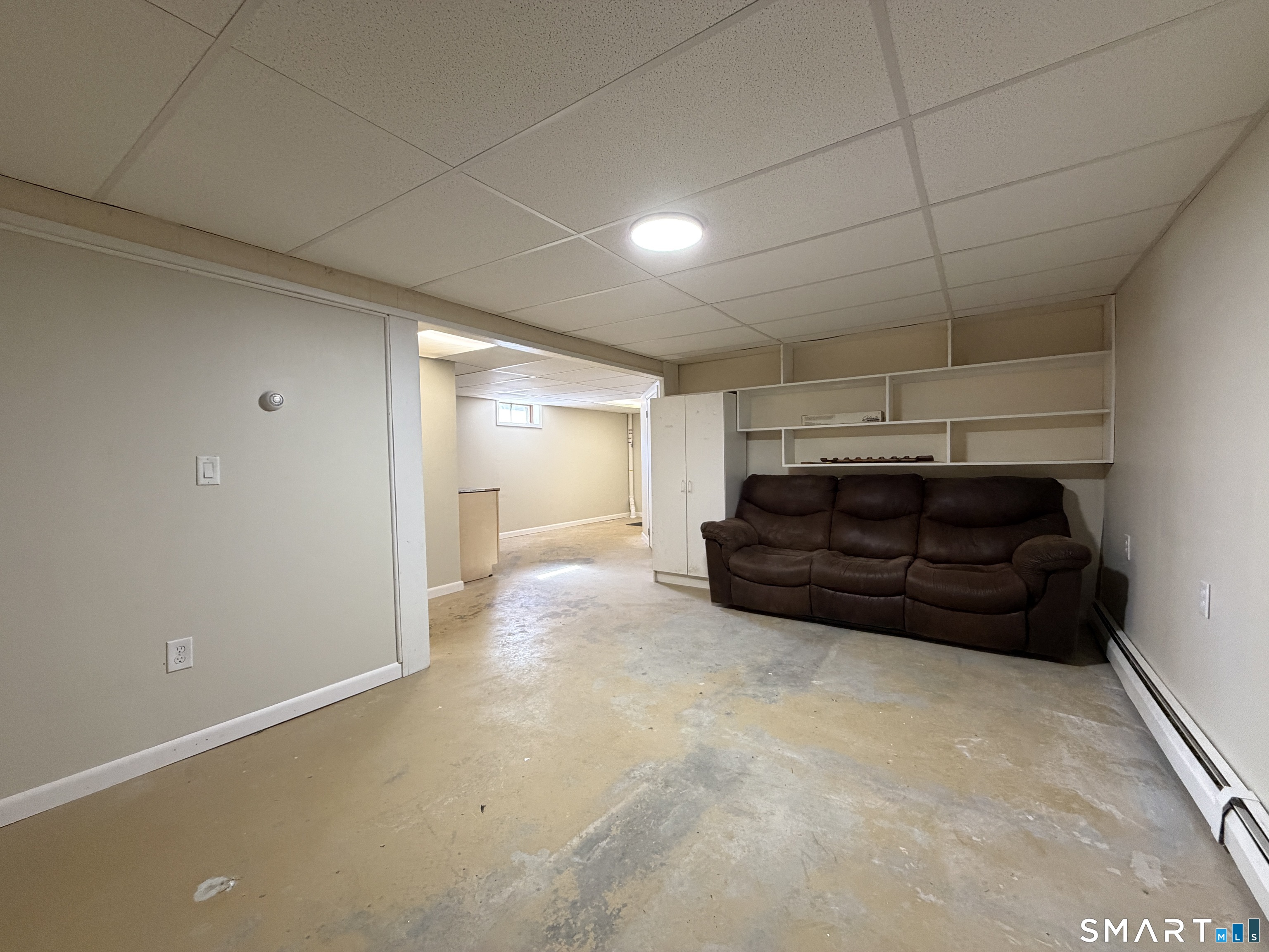 208 Gooseneck Hill Road Canterbury, CT 06331 - Photo 19 of 34 a room with a bed and a cabinets