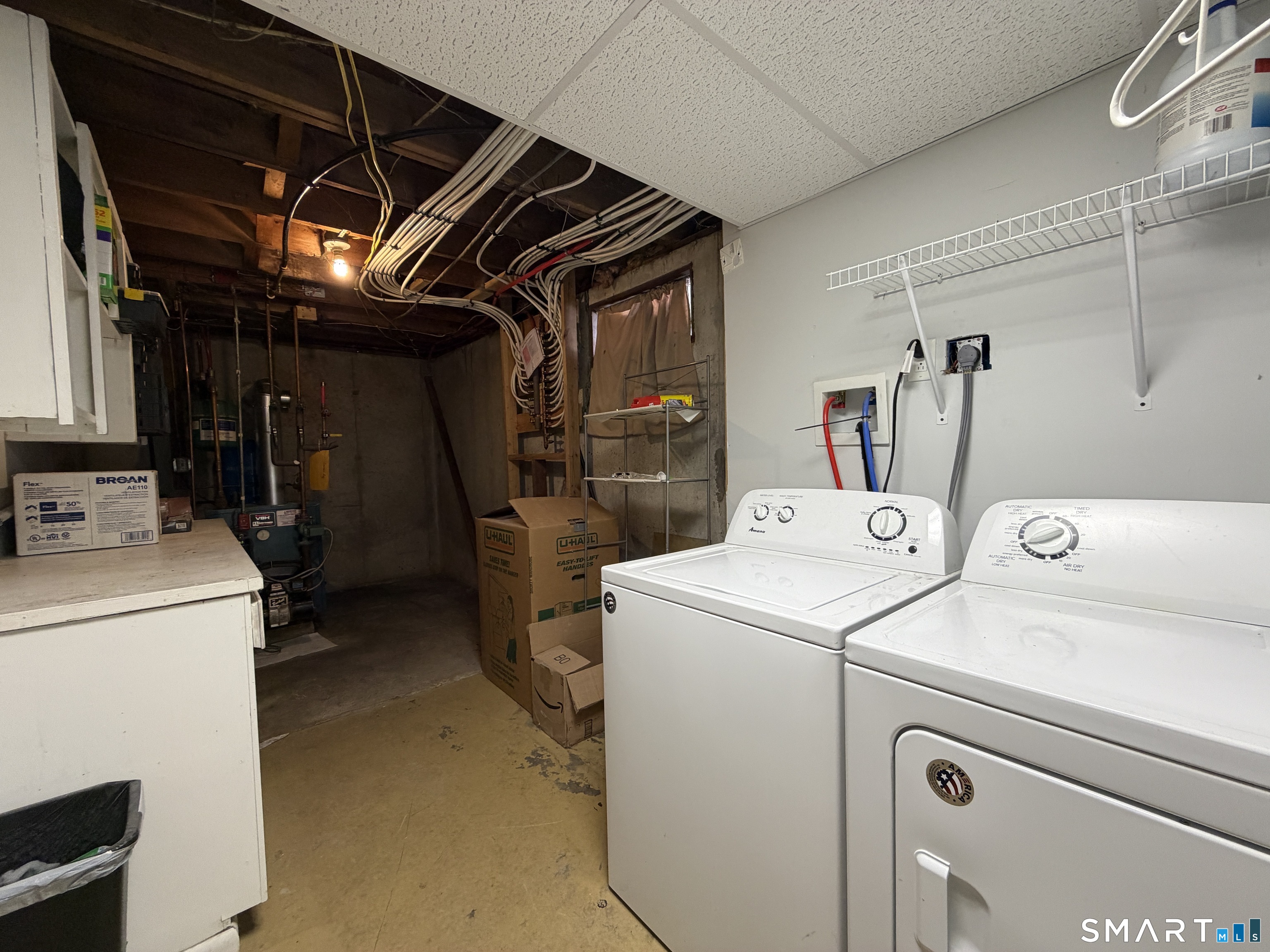 208 Gooseneck Hill Road Canterbury, CT 06331 - Photo 23 of 34 a utility room with dryer and washer