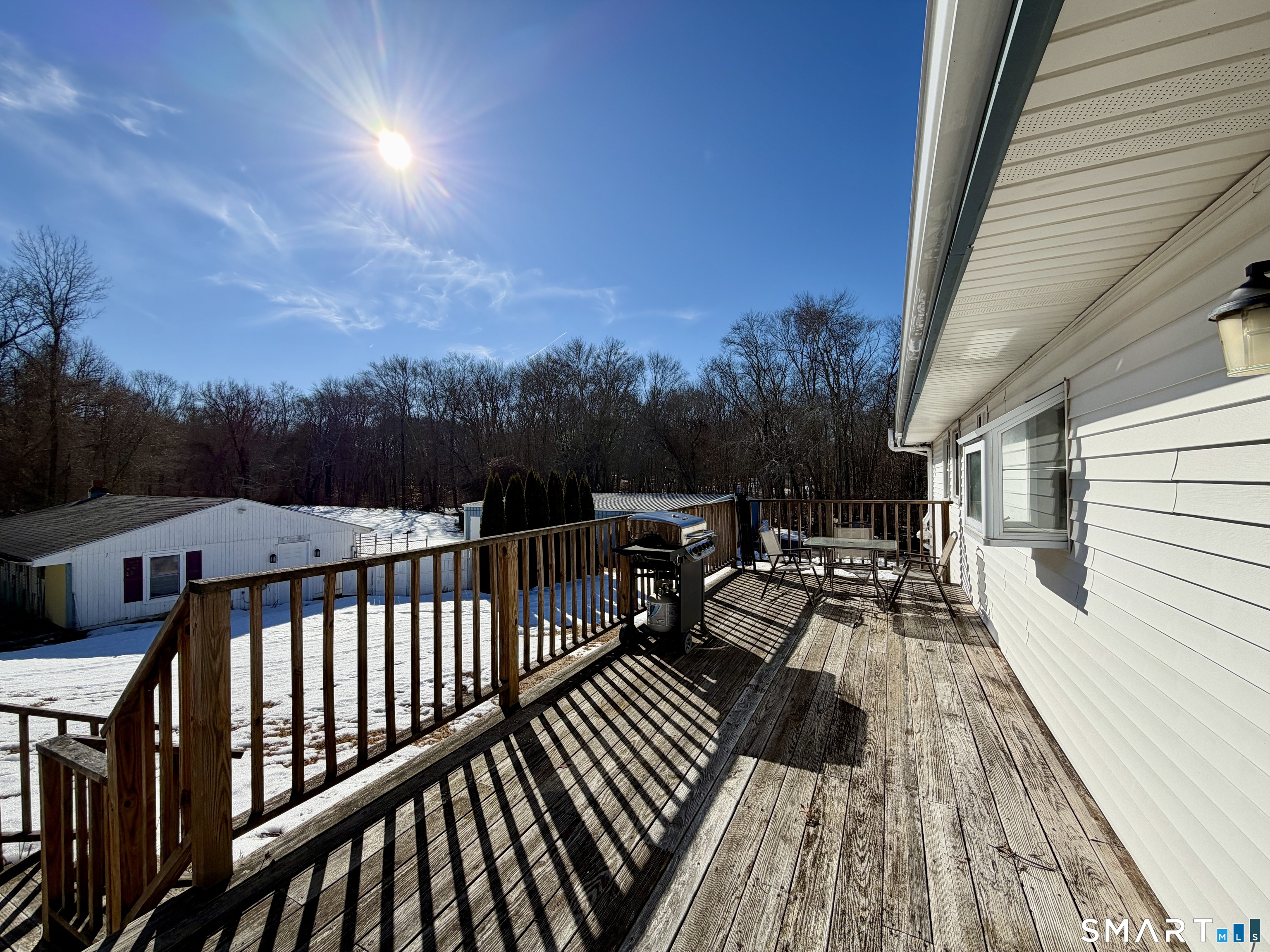 208 Gooseneck Hill Road Canterbury, CT 06331 - Photo 30 of 34 a view of balcony with wooden floor and iron fence