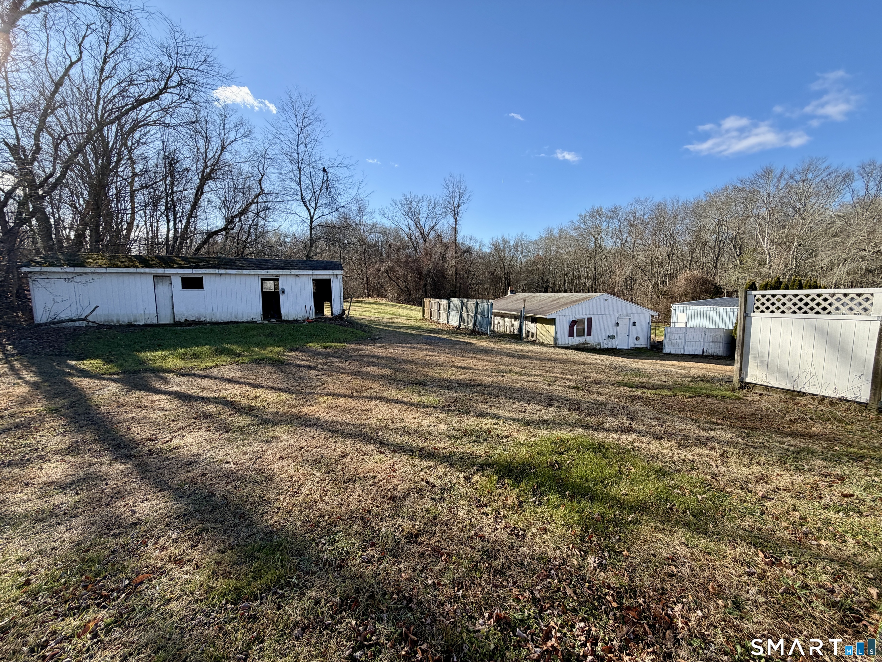 208 Gooseneck Hill Road Canterbury, CT 06331 - Photo 33 of 34 a view of a yard with wooden fence