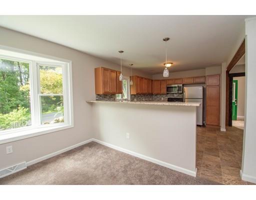 6 Pine Ridge Road Montgomery, MA 01085 - Photo 6 of 20 a kitchen with a refrigerator and a window