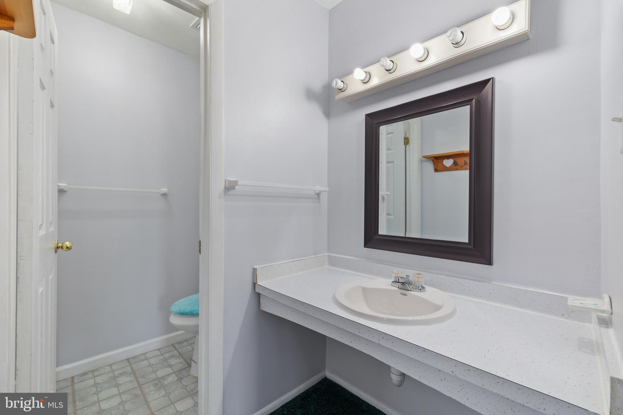 13601 Lindendale Road Woodbridge, VA 22193 - Photo 19 of 45 Half Bathroom in Master Bedroom