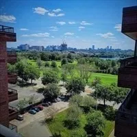 a bedroom with bed and window