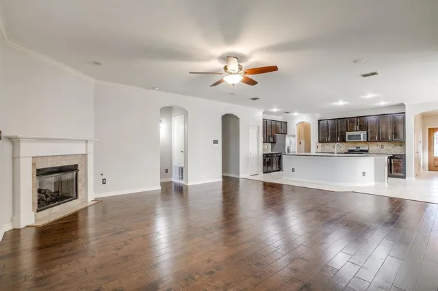 a view of a kitchen with a sink and cabinets
