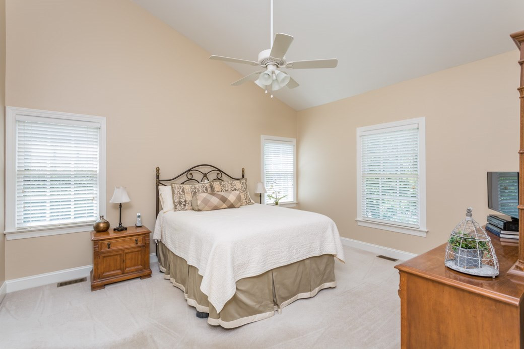 The master bedroom has a vaulted ceiling and a fan. Fresh paint throughout and plenty of storage space this home has it all. Master Bedroom
