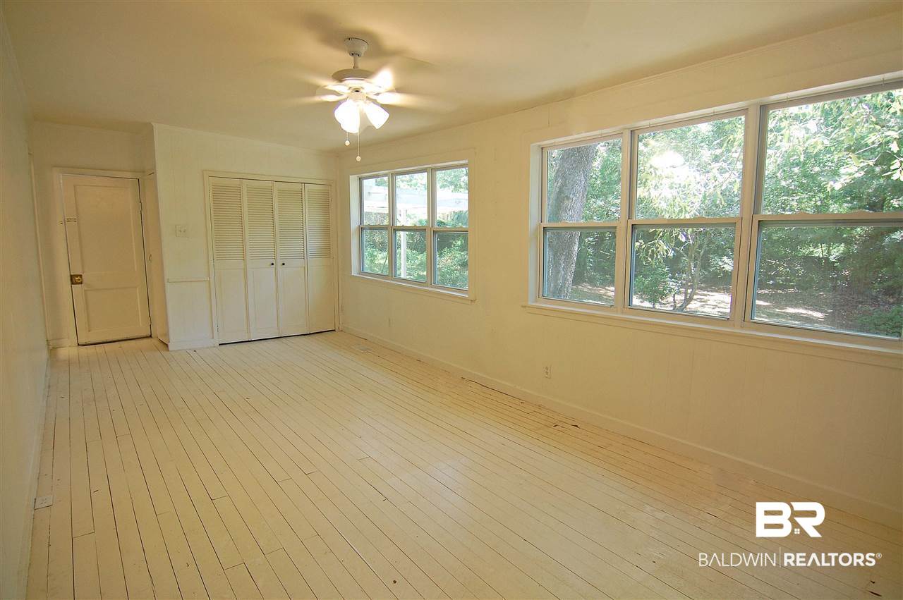 106 Pier Avenue Fairhope, AL 36532 - Photo 9 of 13 Bonus room is off kitchen and bedroom one