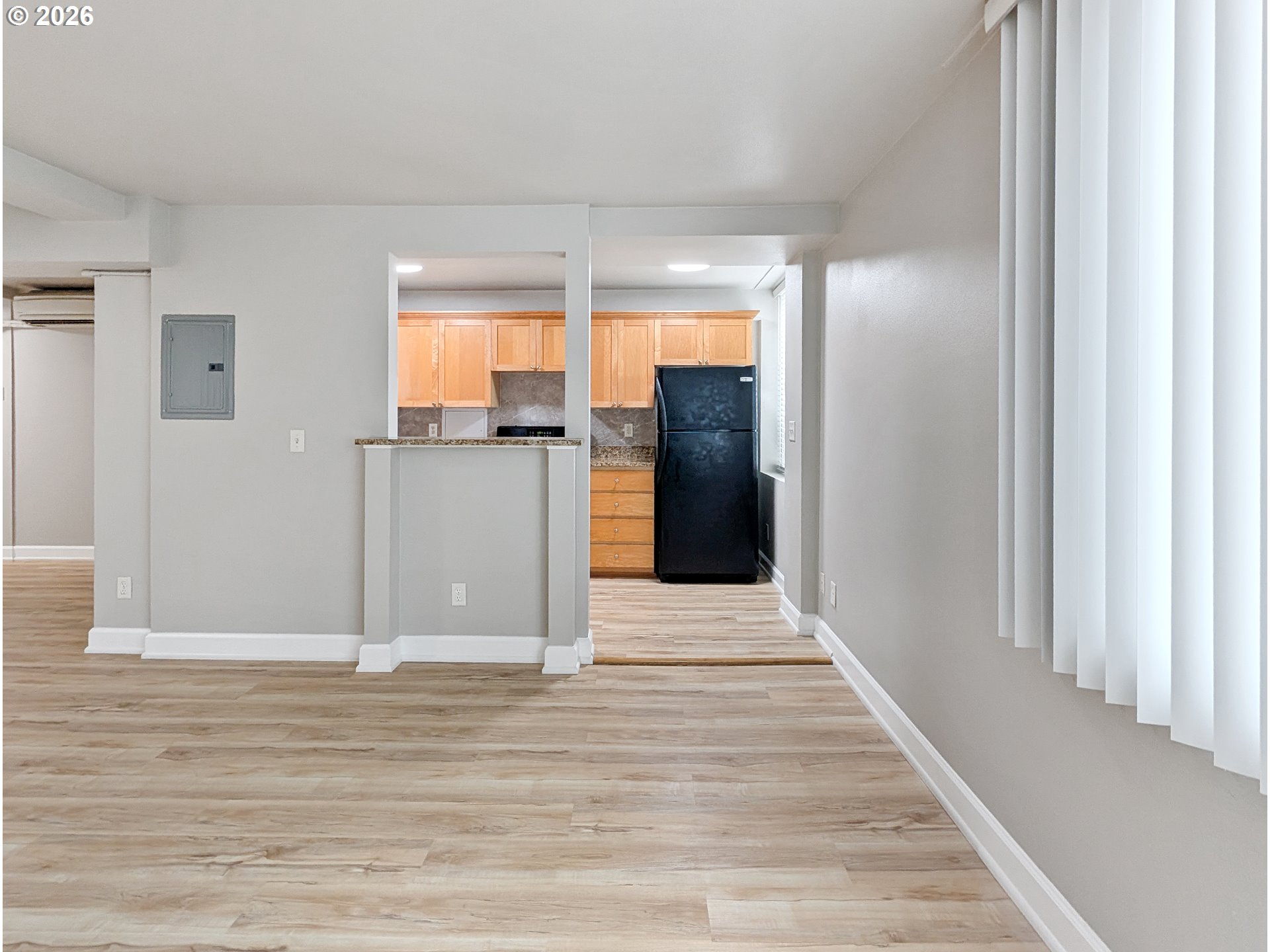1205 Southwest Cardinell Drive, Unit 609 Portland, OR 97201 - Photo 8 of 13 a view of a room with wooden floor