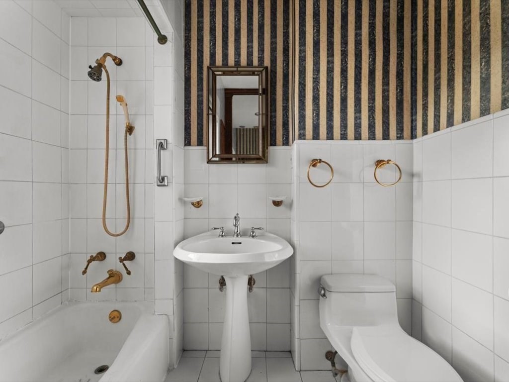 26 Beaufort Road, Unit 2 Boston, MA 02130 - Photo 24 of 34 a bathroom with a sink a toilet and shower