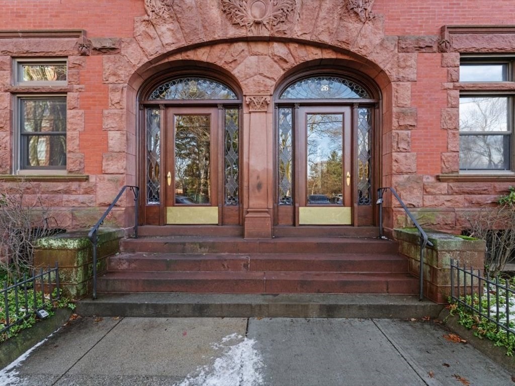 26 Beaufort Road, Unit 2 Boston, MA 02130 - Photo 29 of 34 a front view of a house with a outdoor seating