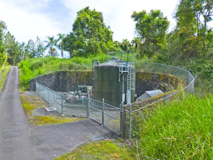 a view of a backyard with swimming pool