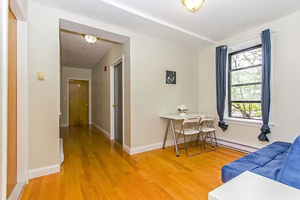 a work room with furniture and window