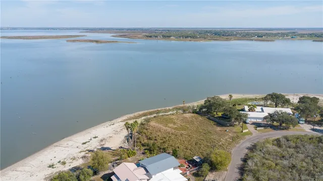 a view of a bedroom with a bed