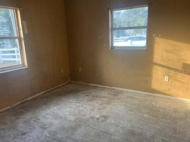 6702 Rocky Point Road Lake Wales, FL 33898 - Photo 7 of 10 an empty room with windows