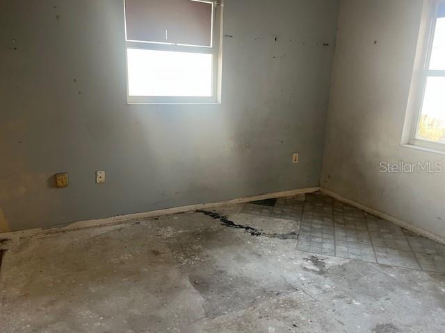 6702 Rocky Point Road Lake Wales, FL 33898 - Photo 8 of 10 an empty room with a window