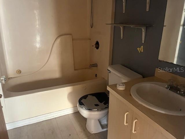 6702 Rocky Point Road Lake Wales, FL 33898 - Photo 9 of 10 a bathroom with a sink a toilet and shower