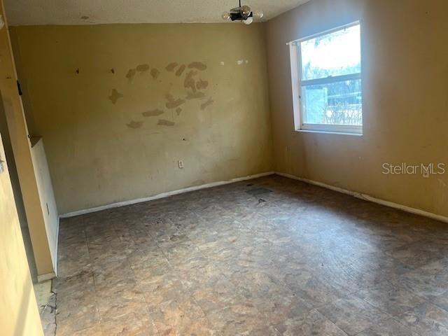6702 Rocky Point Road Lake Wales, FL 33898 - Photo 10 of 10 an empty room with windows