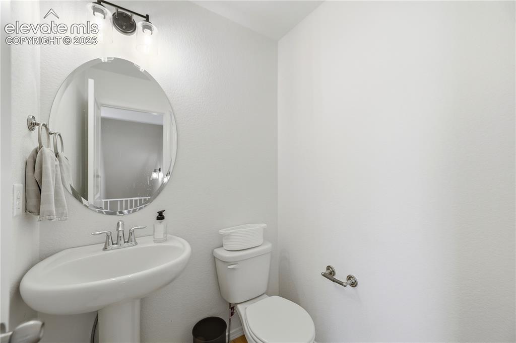 9830 Hidden Ranch Court Peyton, CO 80831 - Photo 17 of 45 Half Bath on Main Floor