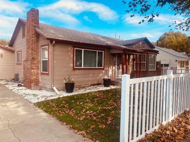 9 4th Avenue Isleton, CA 95641 - Photo 1 of 10 a view of a house with wooden fence