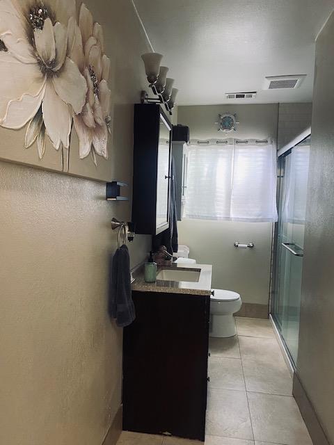 9 4th Avenue Isleton, CA 95641 - Photo 6 of 10 a bathroom with a sink toilet and mirror