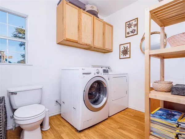 a bathroom with a toilet and a sink