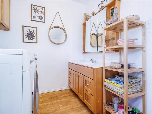 a bathroom with a sink a vanity and a mirror